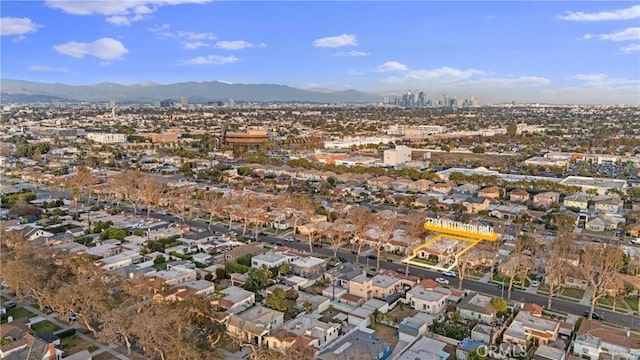 birds eye view of property featuring a mountain view