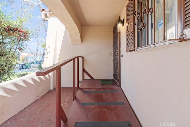 doorway to property featuring a balcony