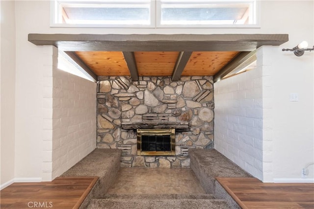 room details featuring a stone fireplace