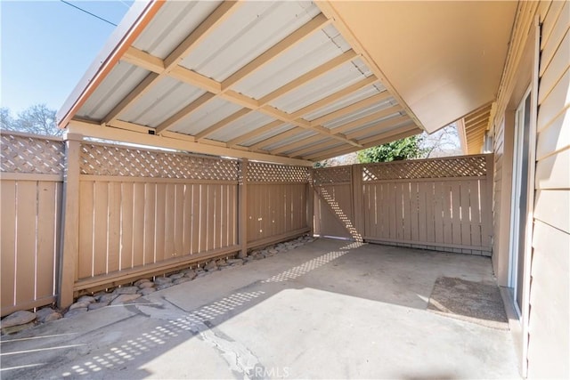 view of patio / terrace with a carport