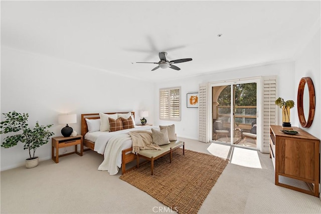 bedroom with ceiling fan, access to outside, and light carpet