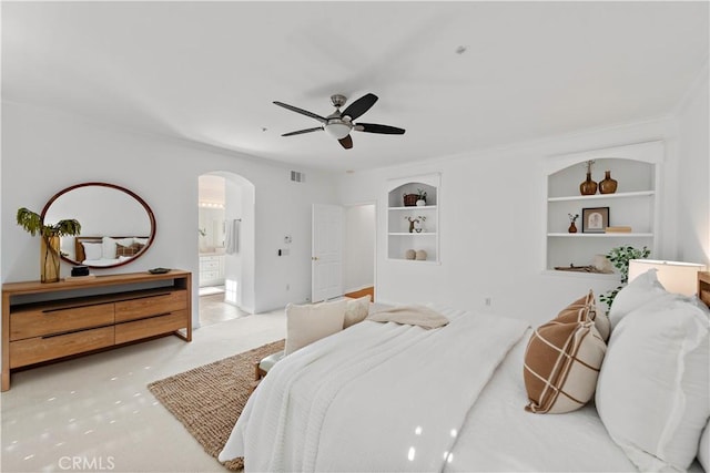 carpeted bedroom with ceiling fan and ensuite bathroom