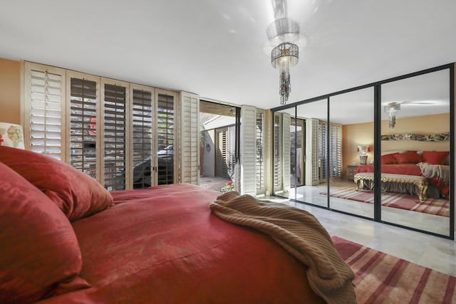 bedroom featuring floor to ceiling windows