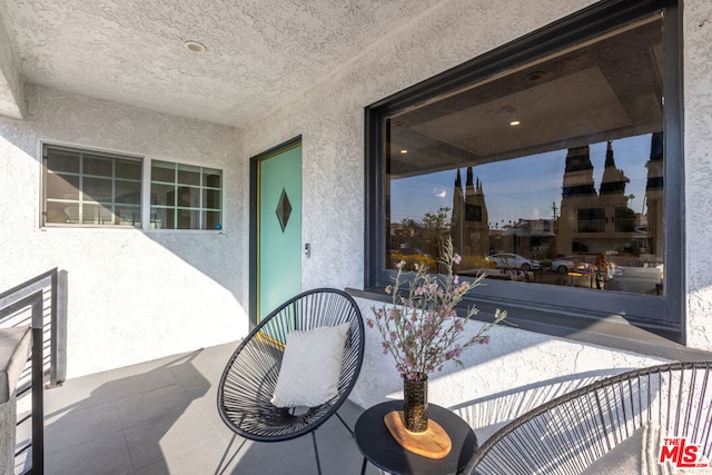 view of patio / terrace featuring a balcony