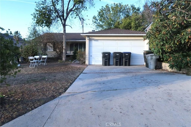 single story home with a garage