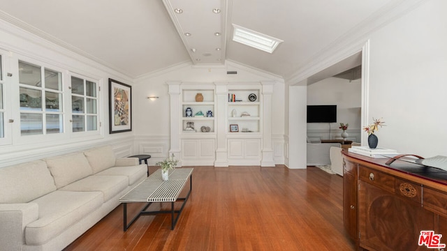 living room featuring crown molding, hardwood / wood-style floors, and vaulted ceiling with skylight