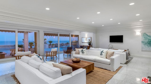 living room featuring a water view