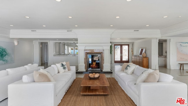 living room featuring crown molding