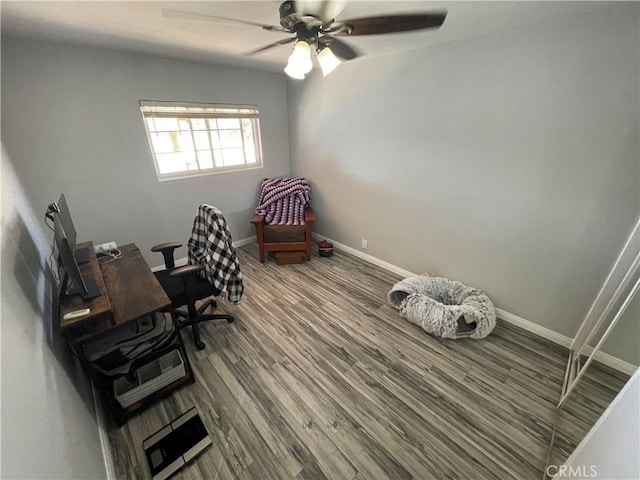 office space with hardwood / wood-style flooring and ceiling fan