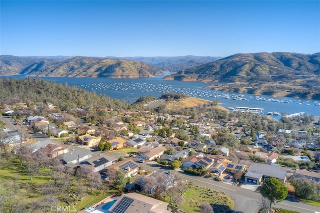 bird's eye view featuring a water and mountain view