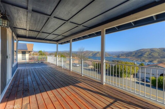 wooden terrace with a mountain view