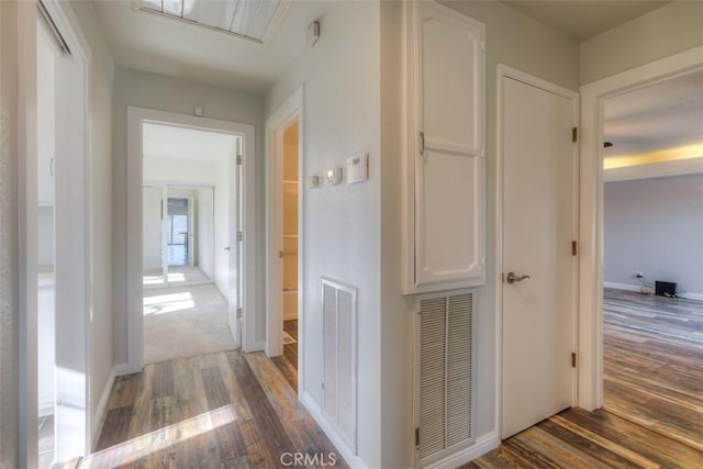 hallway featuring wood-type flooring