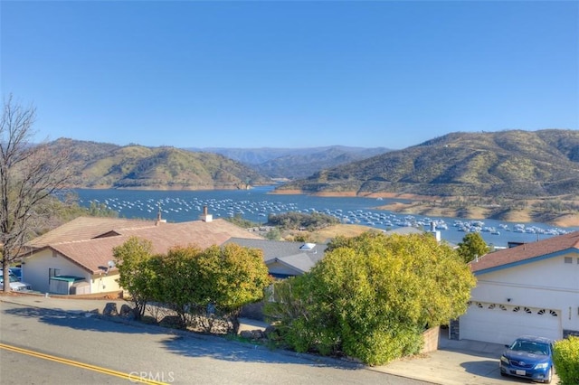 view of mountain feature featuring a water view