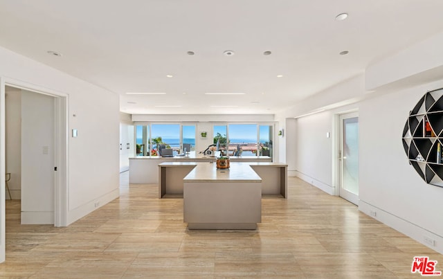 kitchen featuring a center island and kitchen peninsula