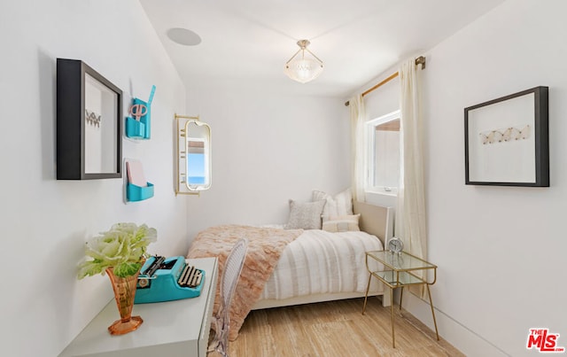 bedroom featuring hardwood / wood-style flooring