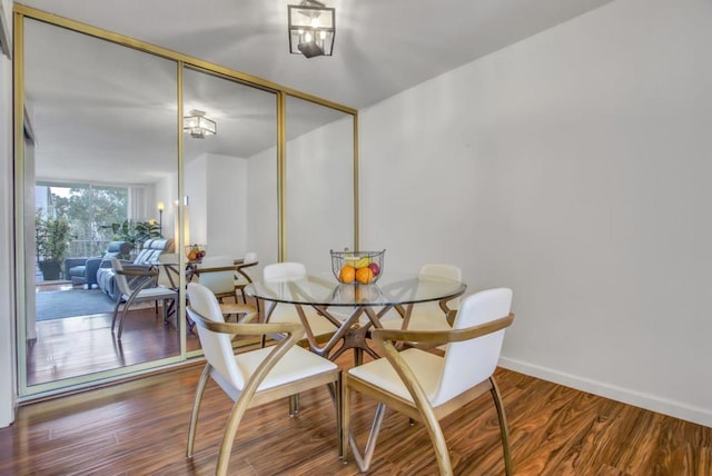 dining room featuring wood-type flooring