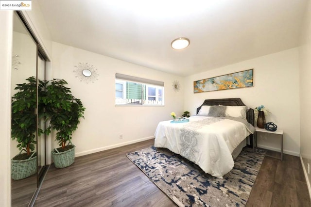 bedroom featuring dark hardwood / wood-style floors