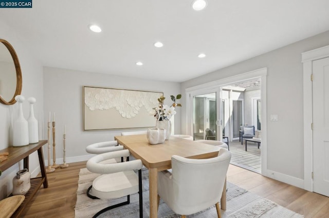 dining room featuring light hardwood / wood-style floors