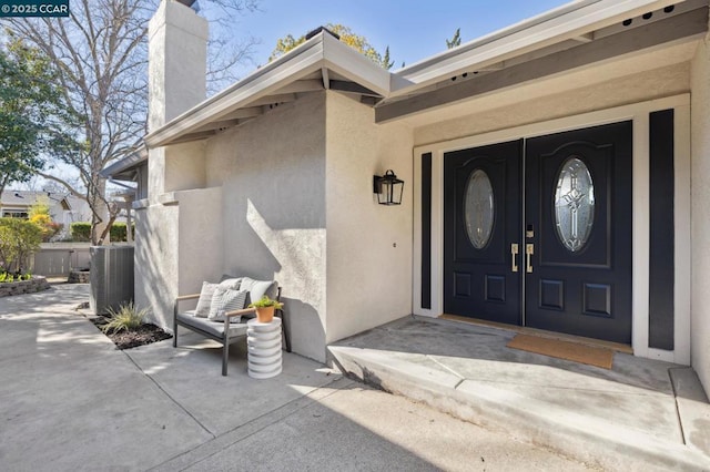 property entrance with cooling unit