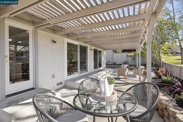 view of patio featuring a pergola