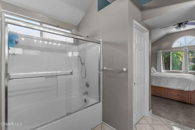 bathroom with tile patterned flooring, shower / bath combination with glass door, and lofted ceiling