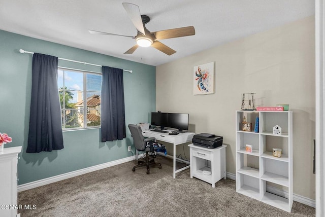 office featuring ceiling fan and carpet