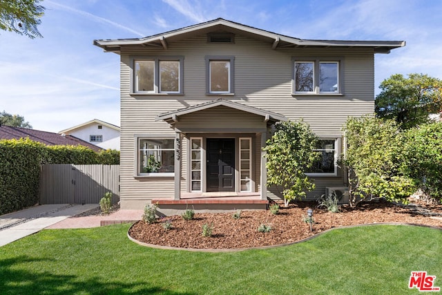 view of front of home with a front yard