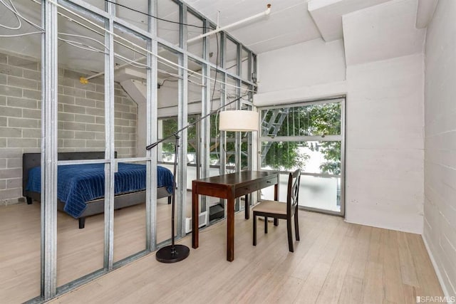 dining space featuring wood-type flooring