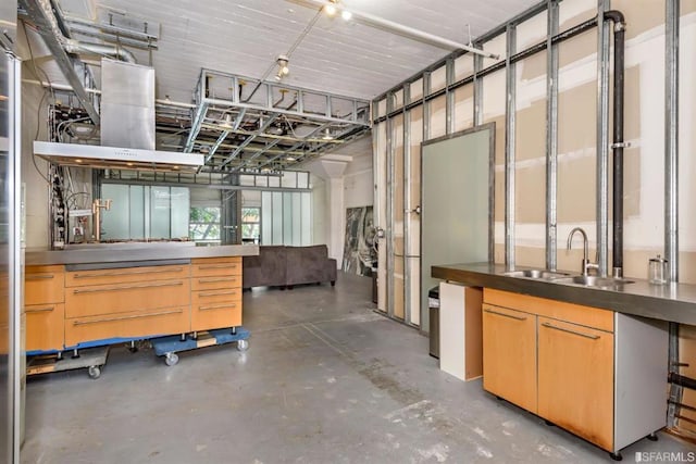 interior space with sink and concrete flooring