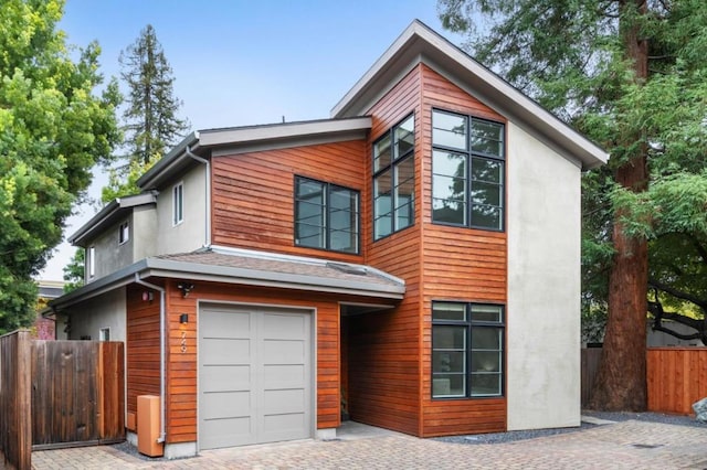 modern home featuring a garage