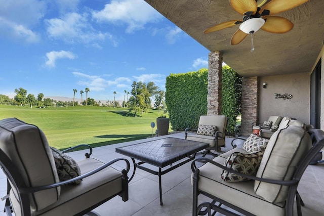 view of patio / terrace featuring ceiling fan and an outdoor hangout area