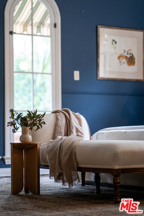 sitting room featuring dark wood-type flooring