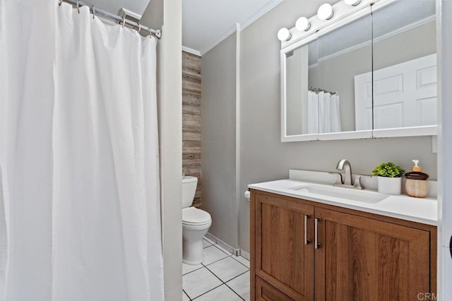 bathroom with tile patterned floors, vanity, ornamental molding, and toilet