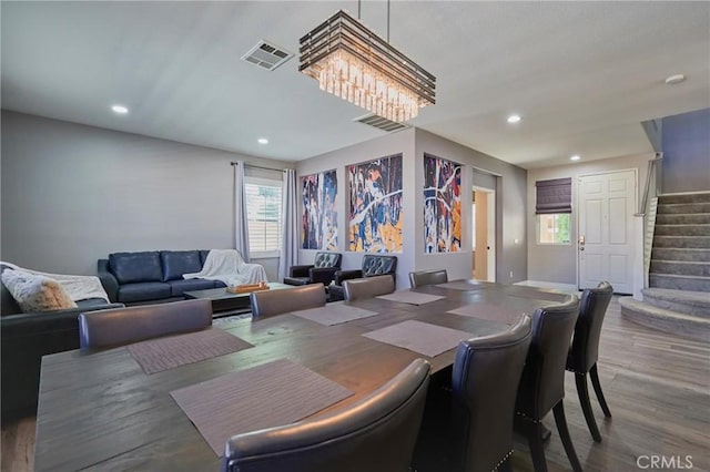 dining space featuring hardwood / wood-style floors