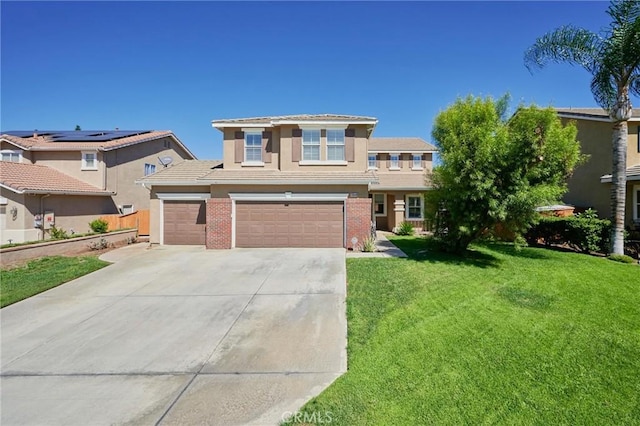 view of front facade with a garage and a front lawn