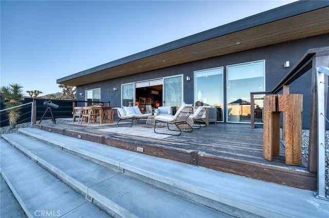 back of property with an outdoor hangout area