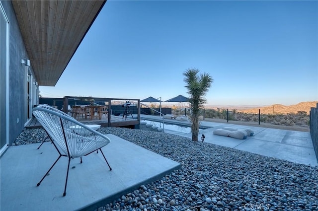 view of patio with a mountain view