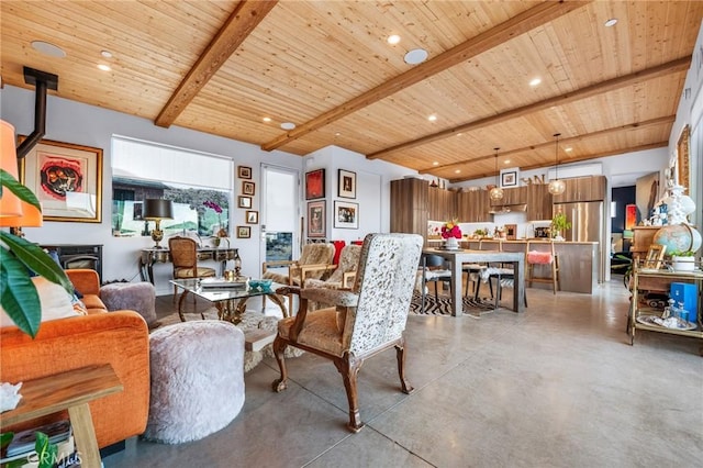 living room featuring wooden ceiling and beamed ceiling