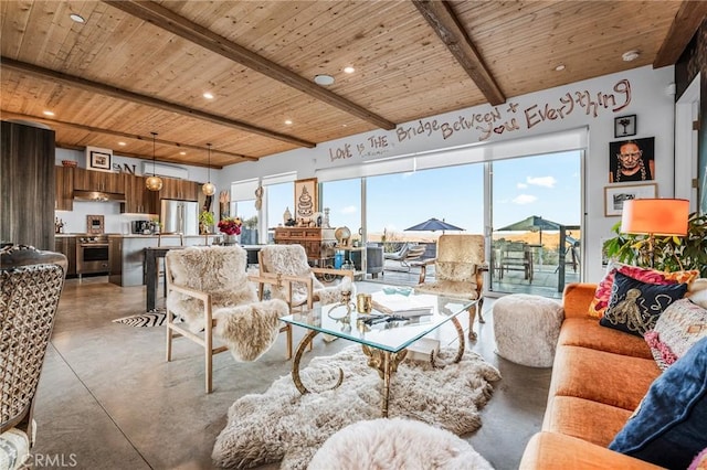 living room featuring wooden ceiling, concrete flooring, and beam ceiling