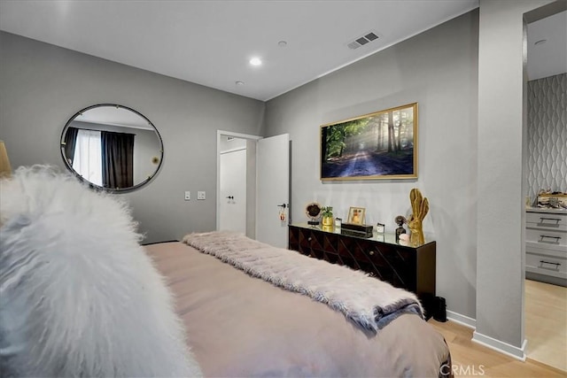 bedroom featuring light hardwood / wood-style flooring