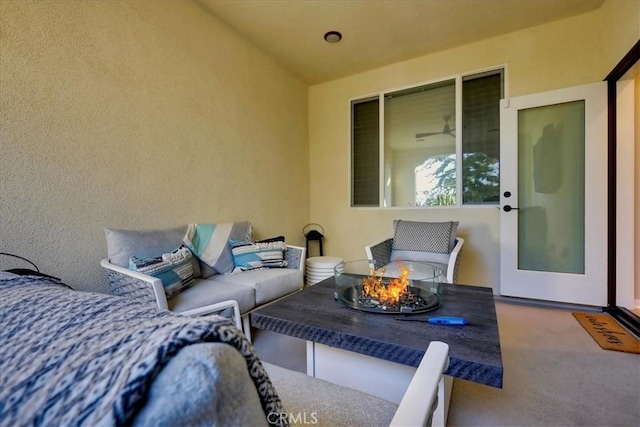 view of patio / terrace with a fire pit