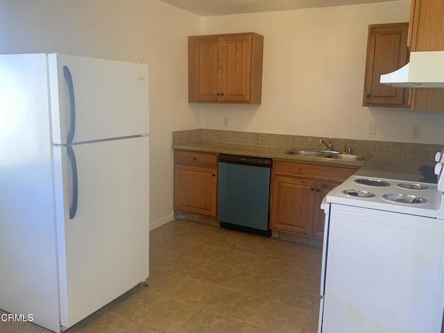 kitchen with sink and white appliances