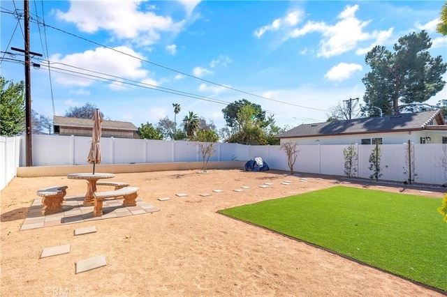 view of yard with a patio area