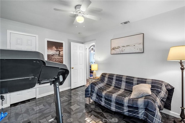 workout room featuring ceiling fan