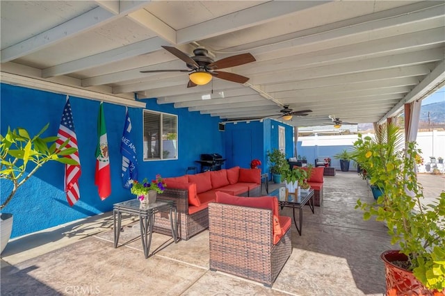 view of patio featuring an outdoor living space, ceiling fan, and area for grilling