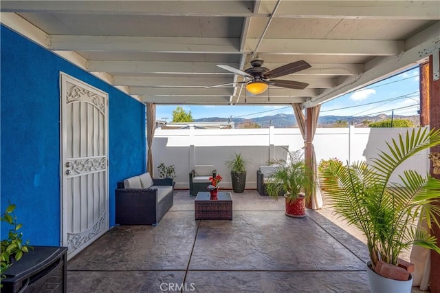 view of patio / terrace with ceiling fan and outdoor lounge area