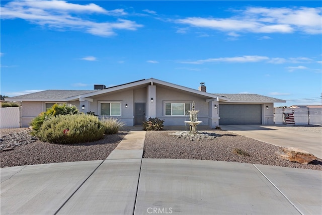 ranch-style home with a garage