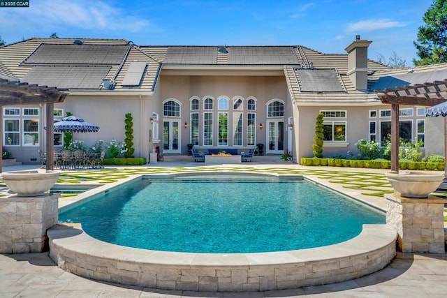 back of house with a patio, french doors, and a pergola