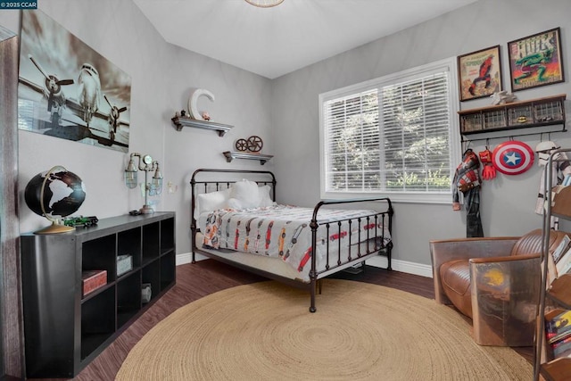 bedroom with wood-type flooring