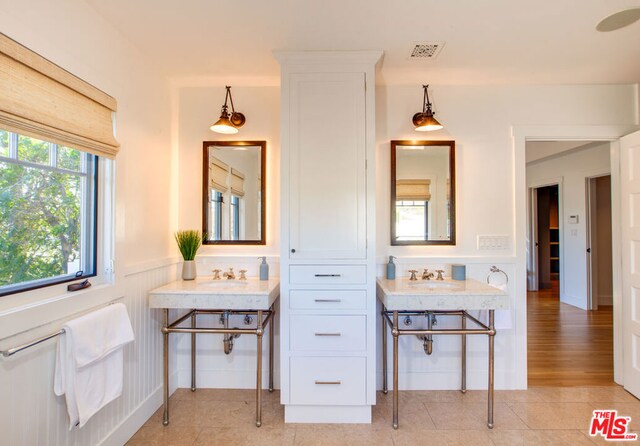 bathroom featuring sink and tile patterned flooring